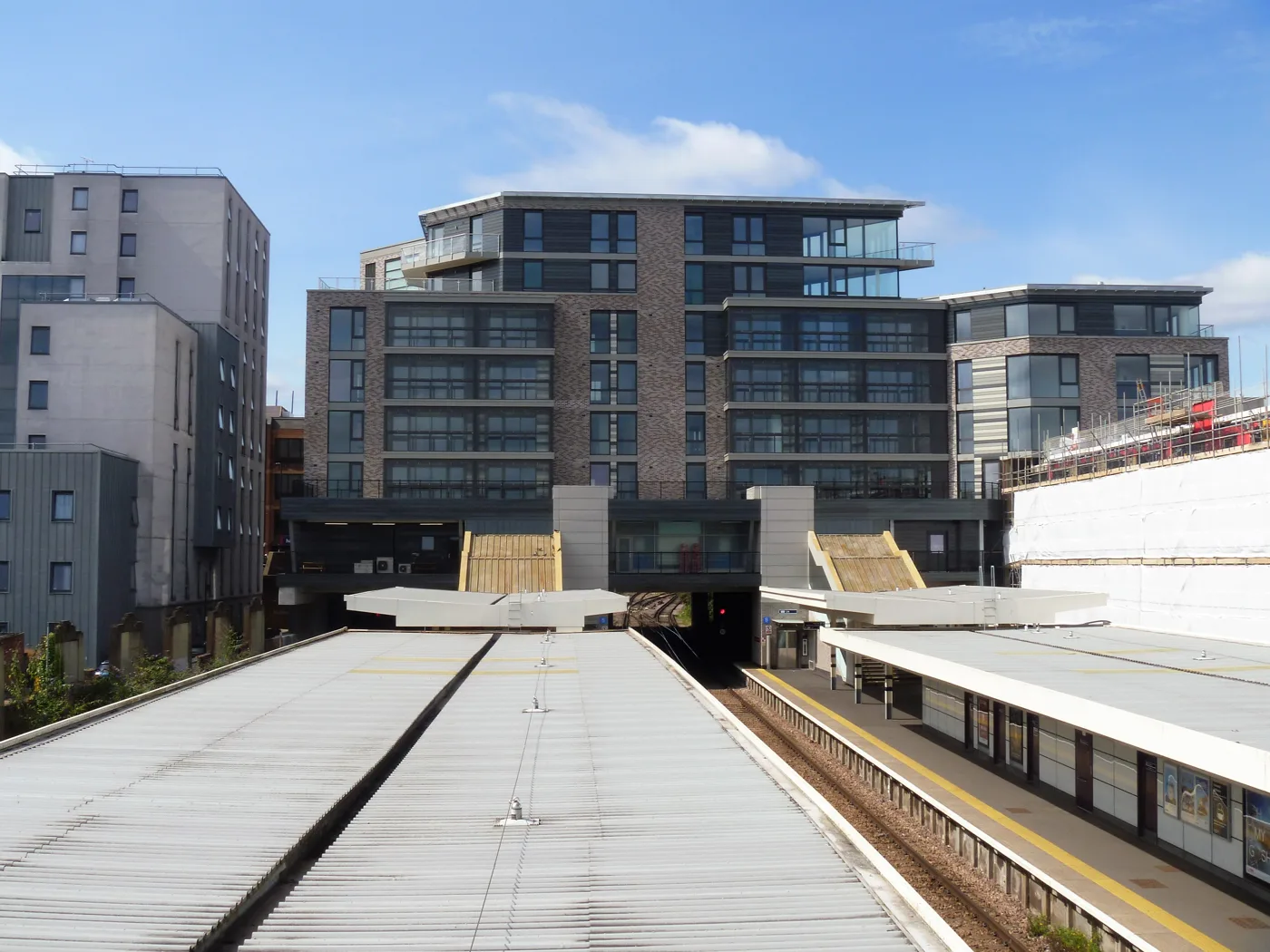 Flats built over Twickenham station, seen from the platforms in 2021. The Crane & Tap is across the road on Brewery Lane and is not in the picture.