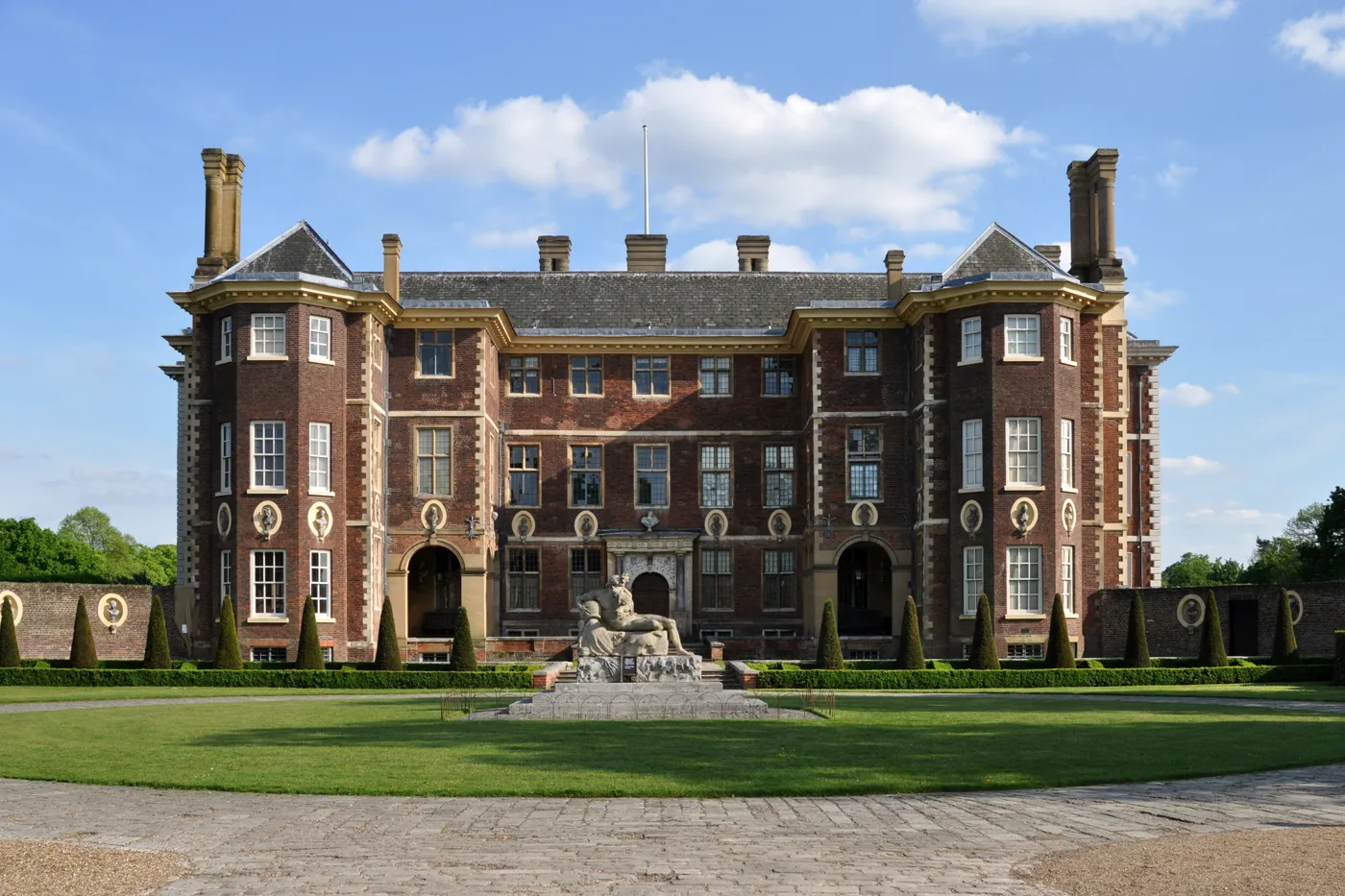 The north front of Ham House and its river god statue, on the Thames at Ham.