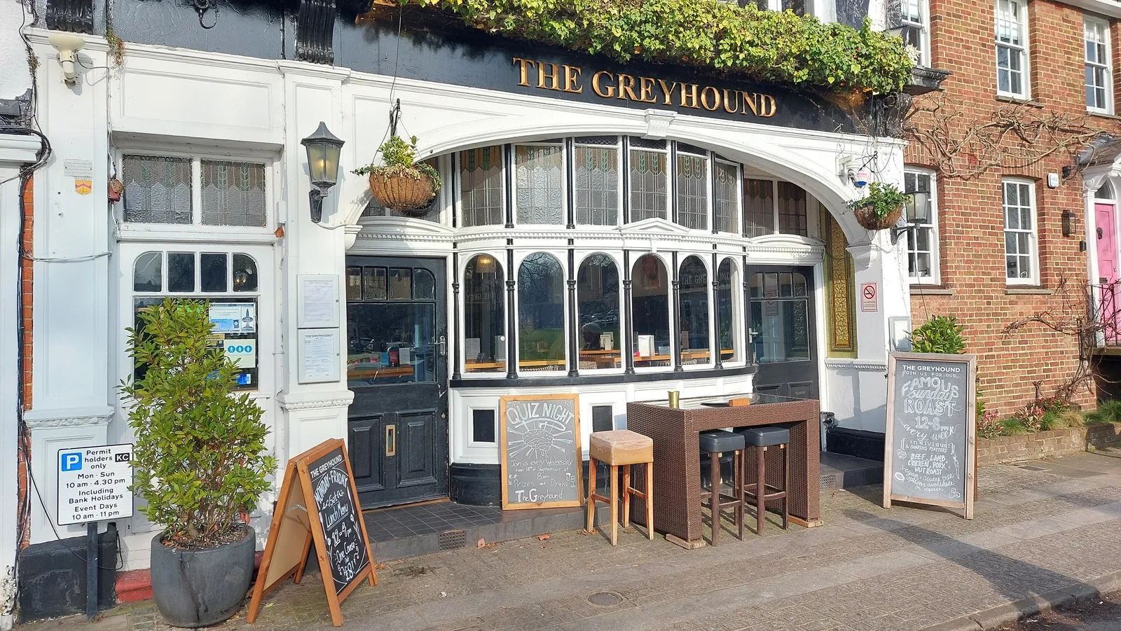 The Greyhound on Kew Green, with its Sunday roast board outside